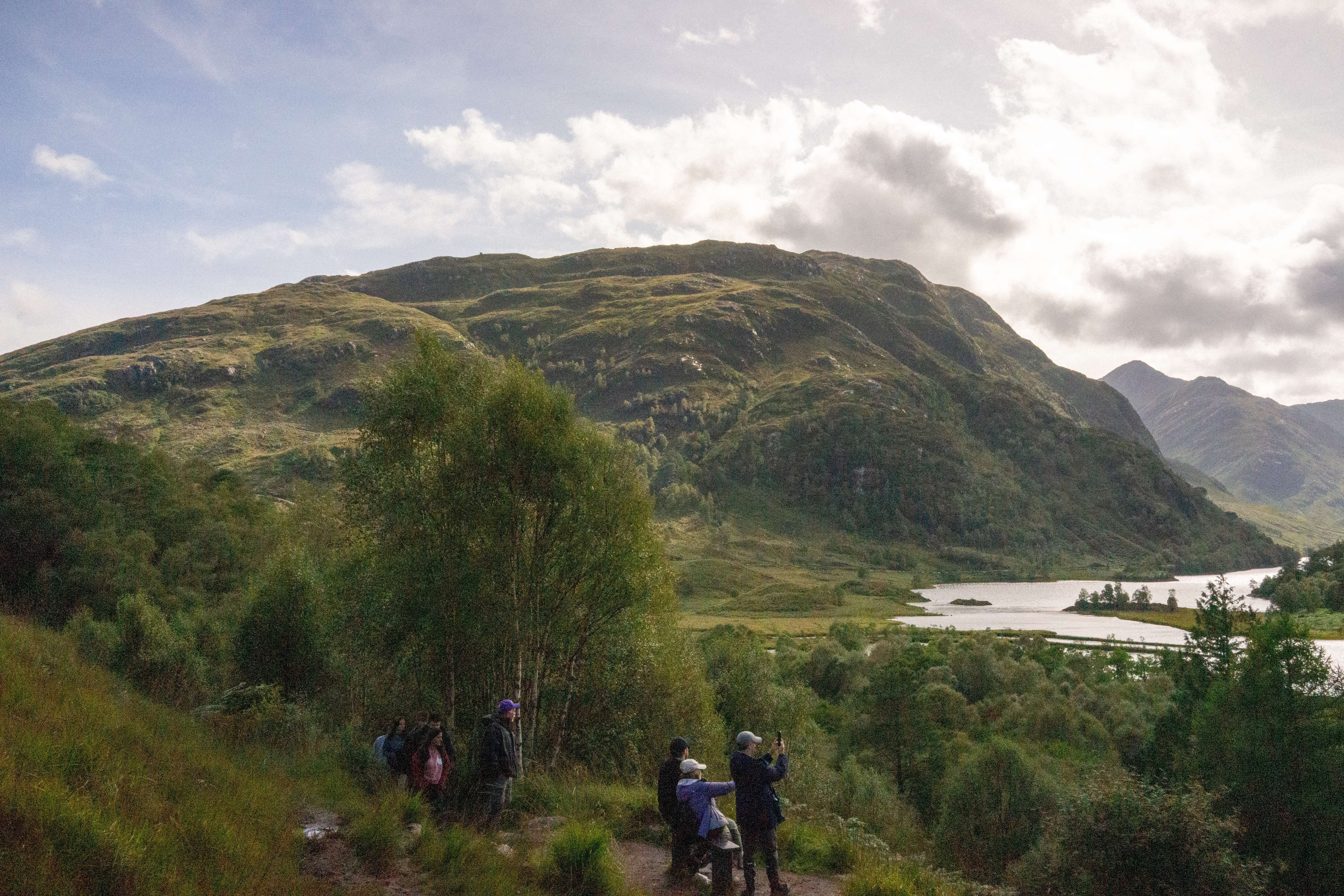 Mountain landscape with people underneath